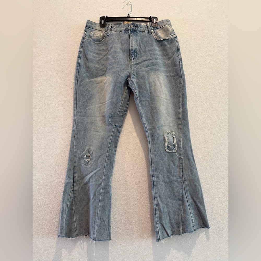 Gallery Dept. flared light wash denim jeans distressed